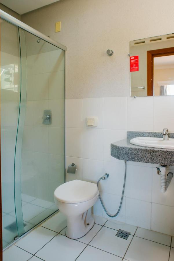 קמפו גרנדה Oyo Cerrado Hotel, Campo Grande מראה חיצוני תמונה A shower cubicle